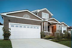 A Home With a White Garage Door | Garage Door Openers