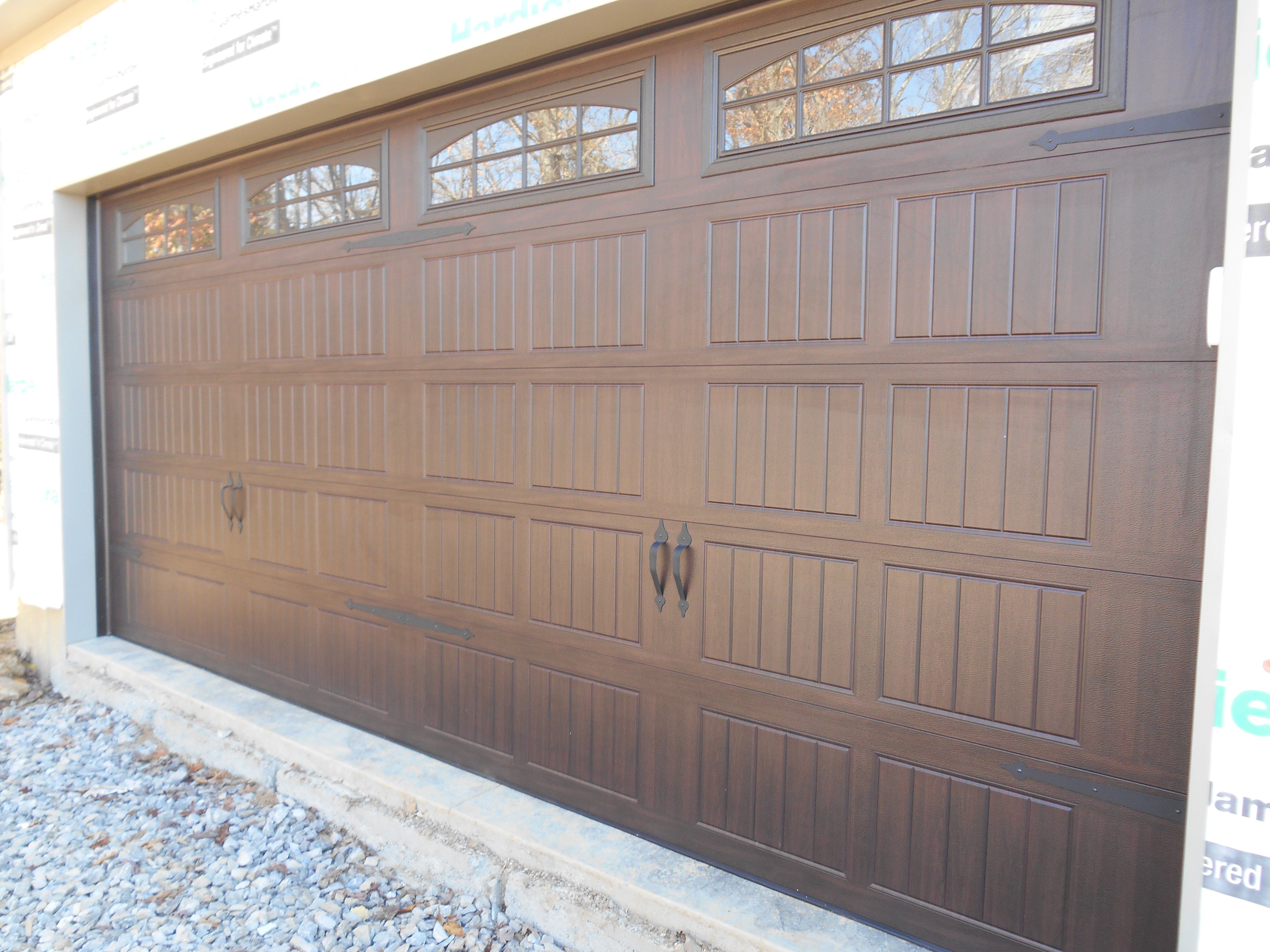 Thermacore Collection 199 Series Color: Walnut wood grain Stockton II window trim